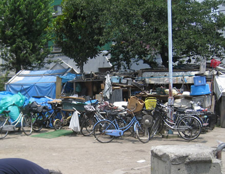 Tents of homeless in Triangle Park in Kamagaseki in Nishinari Ku Osaka Japan